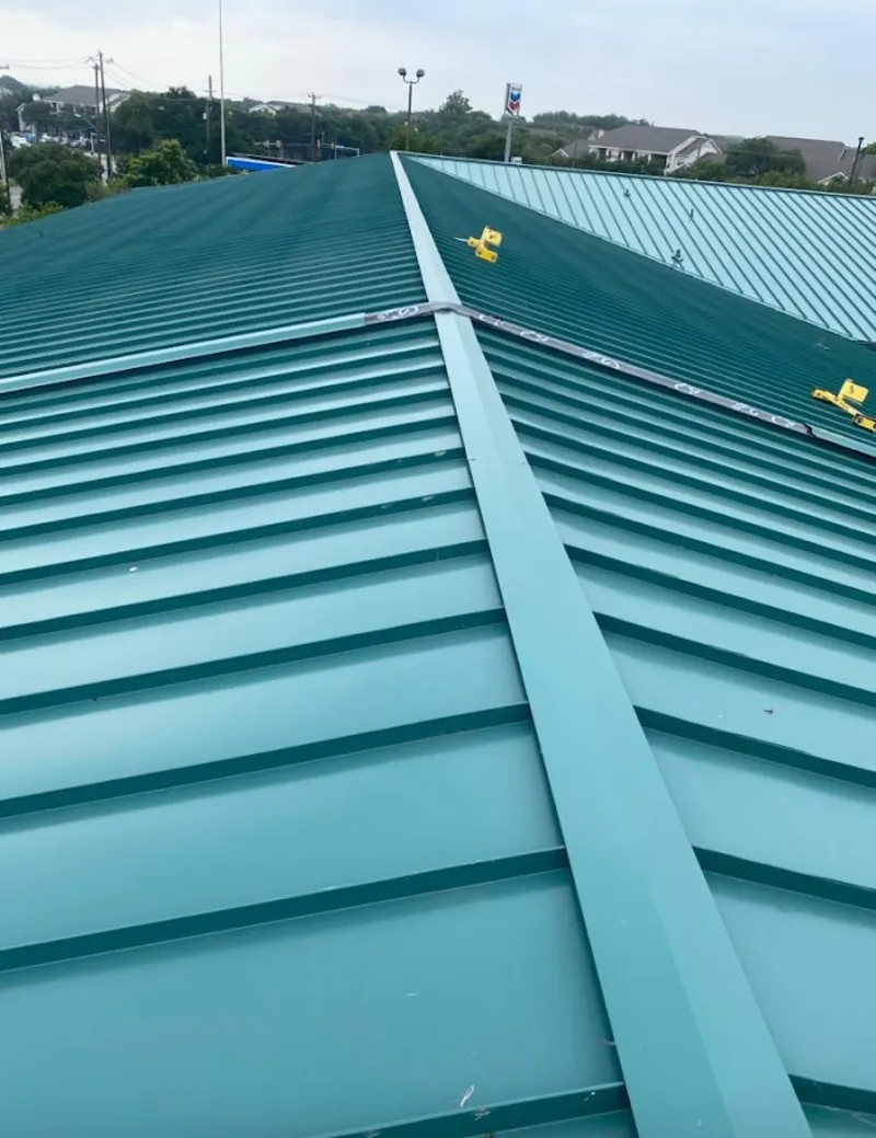 Green commercial metal roof ridge and valley for Metal Roof Repair in Silvis